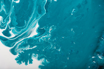 Abstract texture, a mixture of paint and oil. Background.