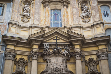 Close-up on the facade of an ancient and sublime Roman church