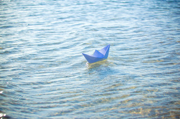 paper boat in the water