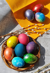 colorful easter eggs in basket