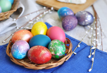 Fototapeta na wymiar colorful easter eggs in basket