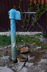 Blue old street water pump for water injection