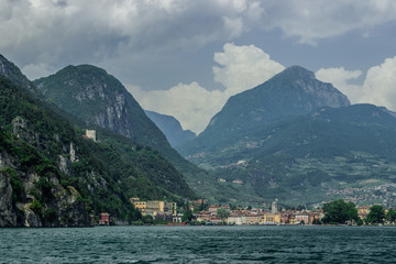 Fototapeta na wymiar Riva del Garda and the old fortress on the mountainside.