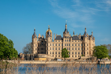 Fototapeta premium the Schwerin castle in spring in the most beautiful weather before blue sky