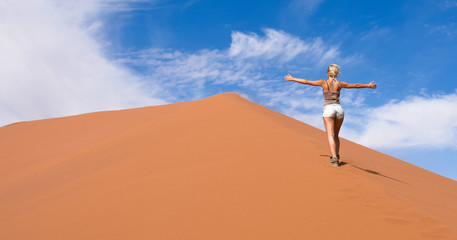 walk on the dunes of the desert in full relax and listening to the silence in the breath of wind