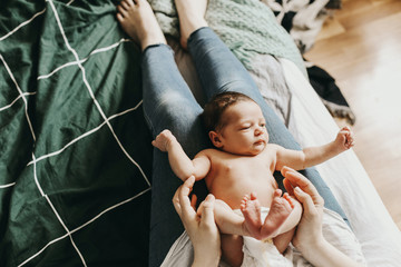 the child lies on his mother's lap