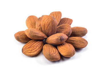 Heap, almonds nuts on white background. close-up, healthy food.