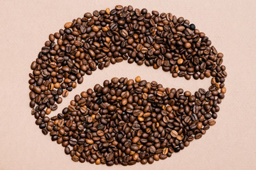 coffee beans laid out in the form of coffee beans on a paper background