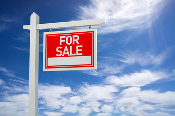 For Sale Real Estate Sign over Clouds and Blue Sky. 3d Illustration