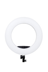 Closeup of circular neon LED lamp isolated white background. Popular modern light for make-up and beauty portraits.