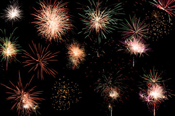 Fototapeta premium Colorful assorted fireworks selection on a black background