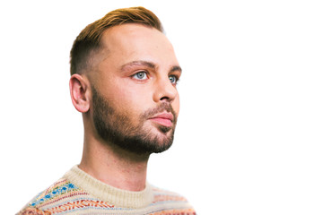 Obraz premium Portrait of a young caucasian stylish and fashionable man with a beard. Homosexual man, gay model posing