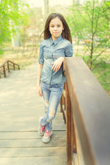 Young beautiful girl posing in the Park