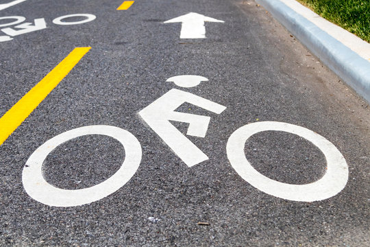 Bike lane safety symbol painted on the street in New York City