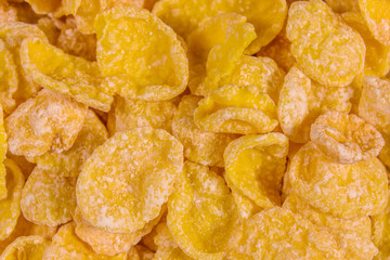 Background of the many yellow cornflakes. Healthy eating