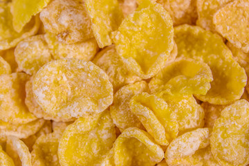 Background of the many yellow cornflakes. Healthy eating