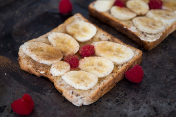 Banana and cinnamon toast with raspberry