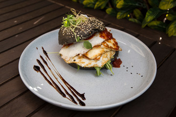 Halloumi burger with black charcoal bun