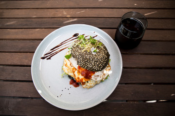 Halloumi burger with black charcoal bun