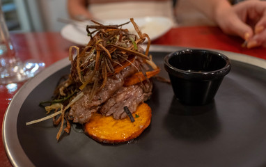 Food served on a dish at a restaurant 