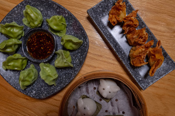 Dumplings served up with sauce in a chinese resturant