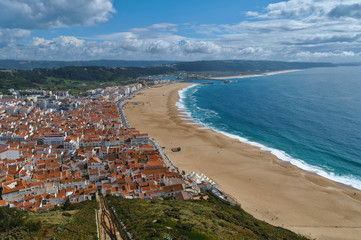 Fototapeta na wymiar Overview of the Village of Nazare, Famous travel destination for surfers in Portugal