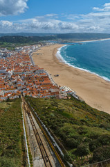 Fototapeta na wymiar Overview of the Village of Nazare, Famous travel destination for surfers in Portugal