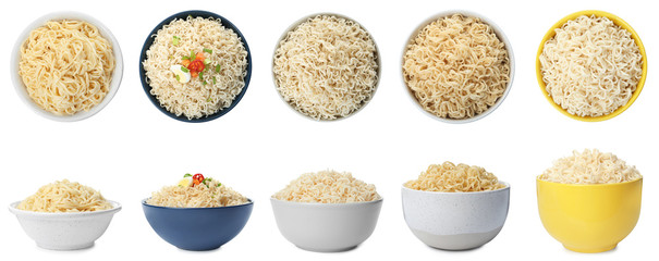 Set of different dishware with delicious cooked noodles on white background