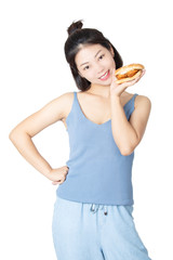 Chinese American woman eating Chicken Sandwich isolated on white background