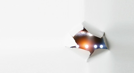 Paper torn hole effect with stadium view