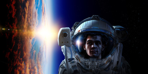 Obraz na płótnie Canvas Astronaut in space on planet orbit.