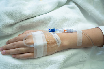 Closeup patien with intravenous normalsaline in hospital