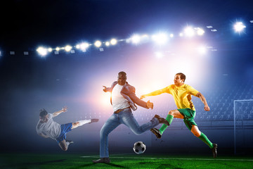 Obraz premium Black man plays his best soccer match. Mixed media