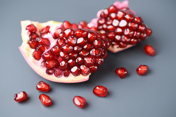 Pomegranate seeds on a dark background