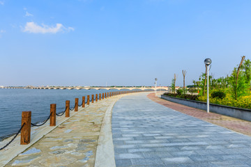 Beautiful lake and walkway with blue sky