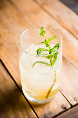 Sweet rum based cocktail with mint. Selective focus. Shallow depth of field.