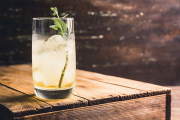 Sweet rum based cocktail with mint. Selective focus. Shallow depth of field.