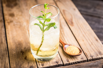 Sweet rum based cocktail with mint. Selective focus. Shallow depth of field.