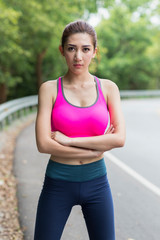 Beautiful asian woman exercising in the park.	