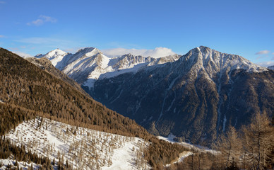 Fototapeta na wymiar Mountains and ski slopes in ski resort Gitschberg Jochtal, Italy.