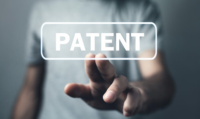 Hand touch in Patent button. Intellectual property
