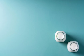 Fresh milk in different glass bottles