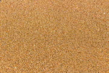 Sand Texture. Brown sand. Background from fine sand. Sand background