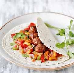 tacos with meatballs and salsa fruit from the medlar. recipes with a medlar. square format 