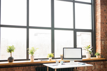 Workplace by office window