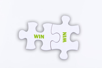 Obraz premium Puzzle with words WIN WIN