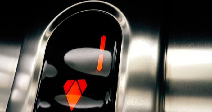 detail of led number of elevator that go up from first to ground floor, business and technology