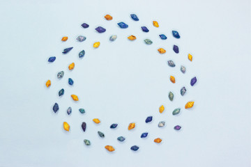 Frame of seashells on pastel blue background. Top view, flat lay, copy space. Sea summer vacation background.