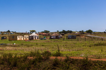 The rural huts and dwellings alongside the train tracks and the Ngwangwane river, Creighton, South Africa.