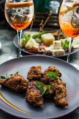fried chicken wings and cheese plate with alcoholic cocktail - 265255660
